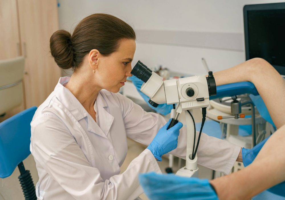 female-gynecologist-examining-patient-on-chair-wit-2023-11-27-05-37-04-utc